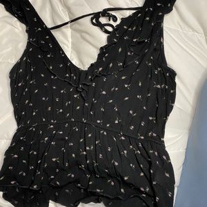 Super cute black floral top.